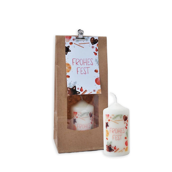 Verpackung mit Kerze in Geschenktüte mit Motiv Frohes Fest